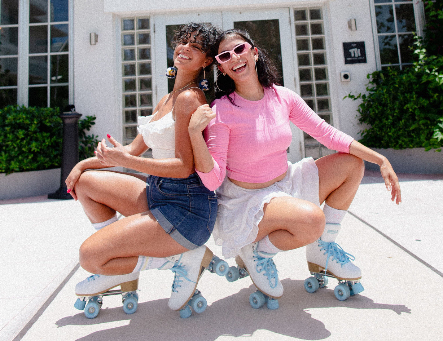 girls wearing new impala white ice quad skates
