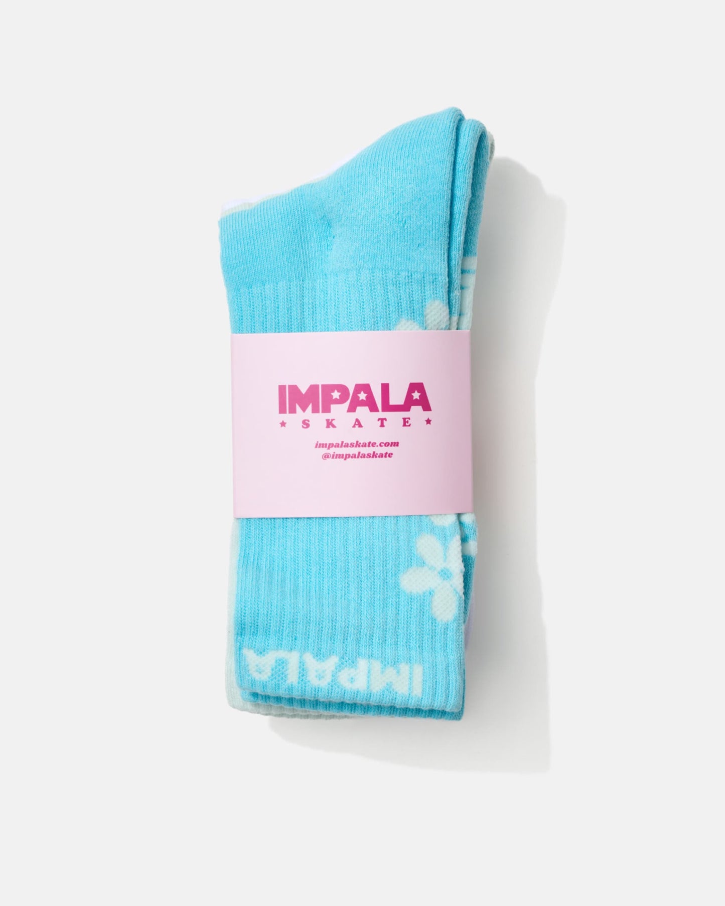 Pack of blue socks with a pink Impala Skate label on a white background