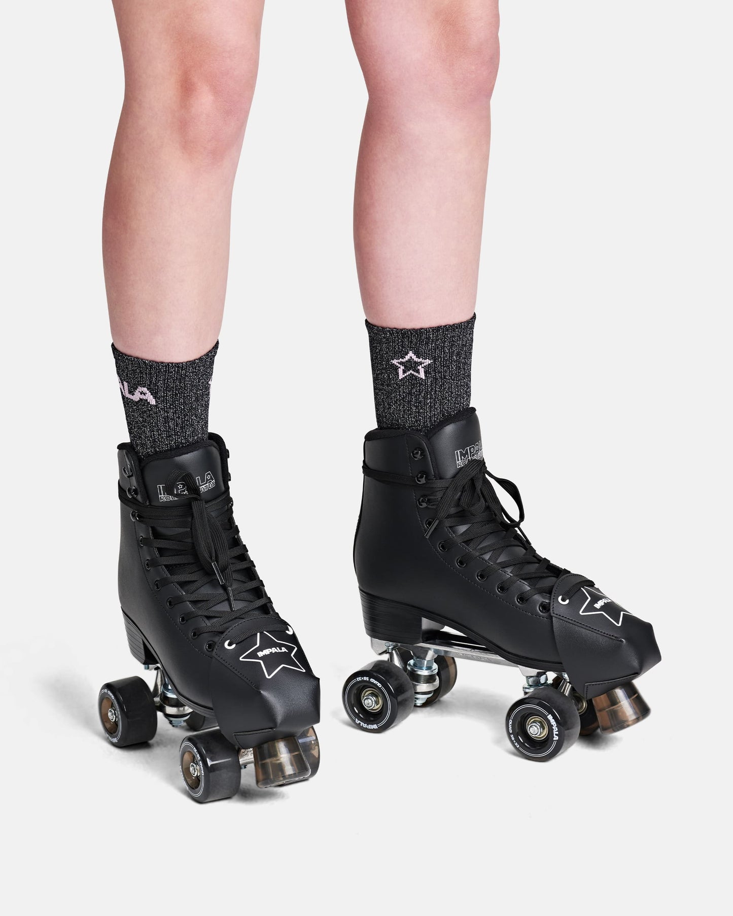 shot of the Impala Toe Guard 2pk - Black on quad skates