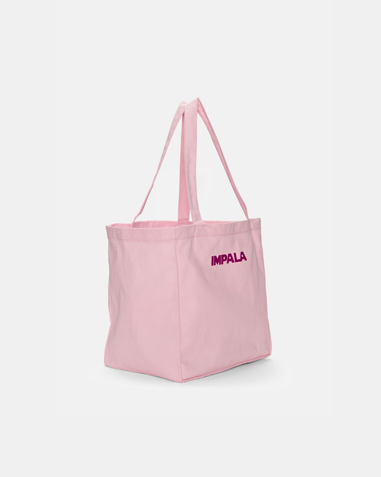 side angle of Impala Skate Pink Tote Bag