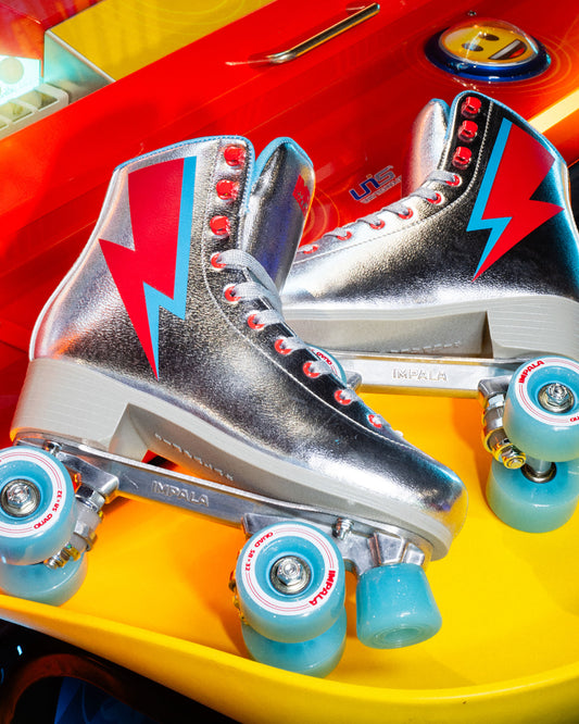 Profile view of the Impala Quad Skate - Argentum. 