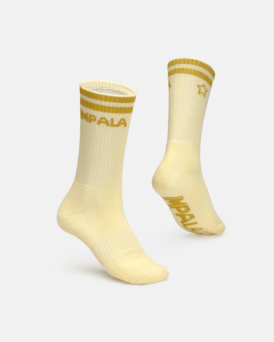 On feet image of the Impala Marawa Sock 3pk - Marawa Gold. 