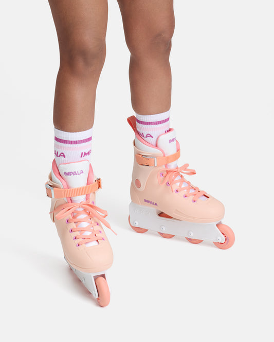 On body view of the Impala Lightspeed Inline Skate - Apricot. 