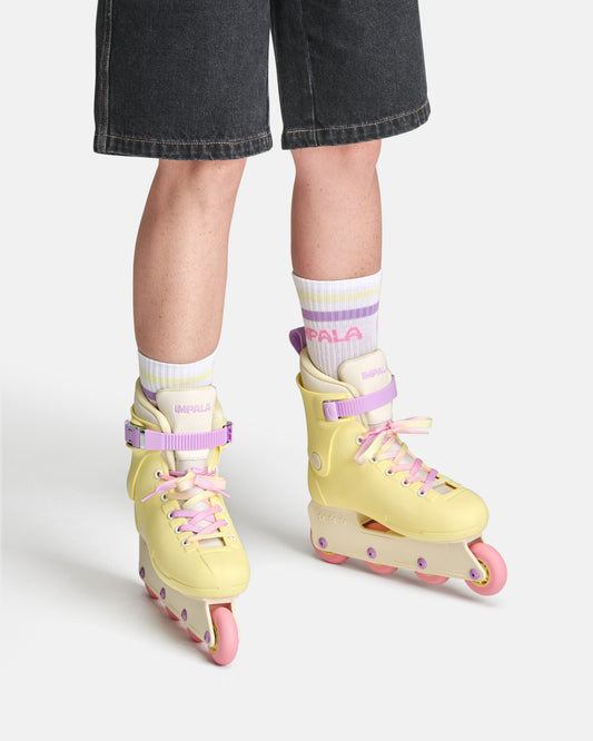 On body front view of the Impala Lightspeed Inline Skate - Buttercup Yellow. 