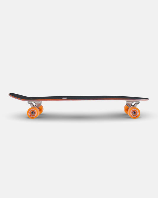 Two Impala Sirena Longboards side by side; left colorful geometric pattern, right dark deck with pink lines