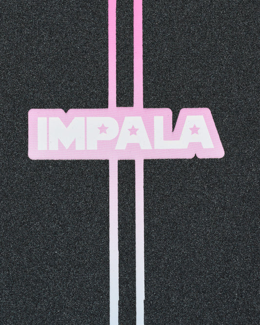 Close up of pink Impala branding on black grip tape covering the longboard deck