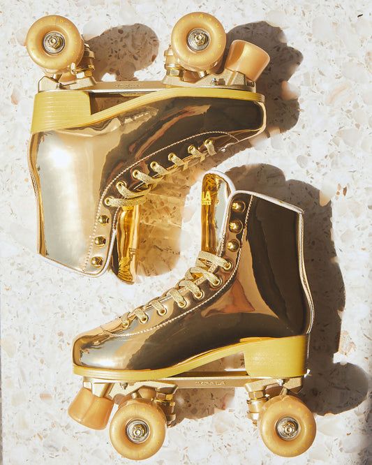 Studio image of the Impala Quad Skate - Marawa Gold. 