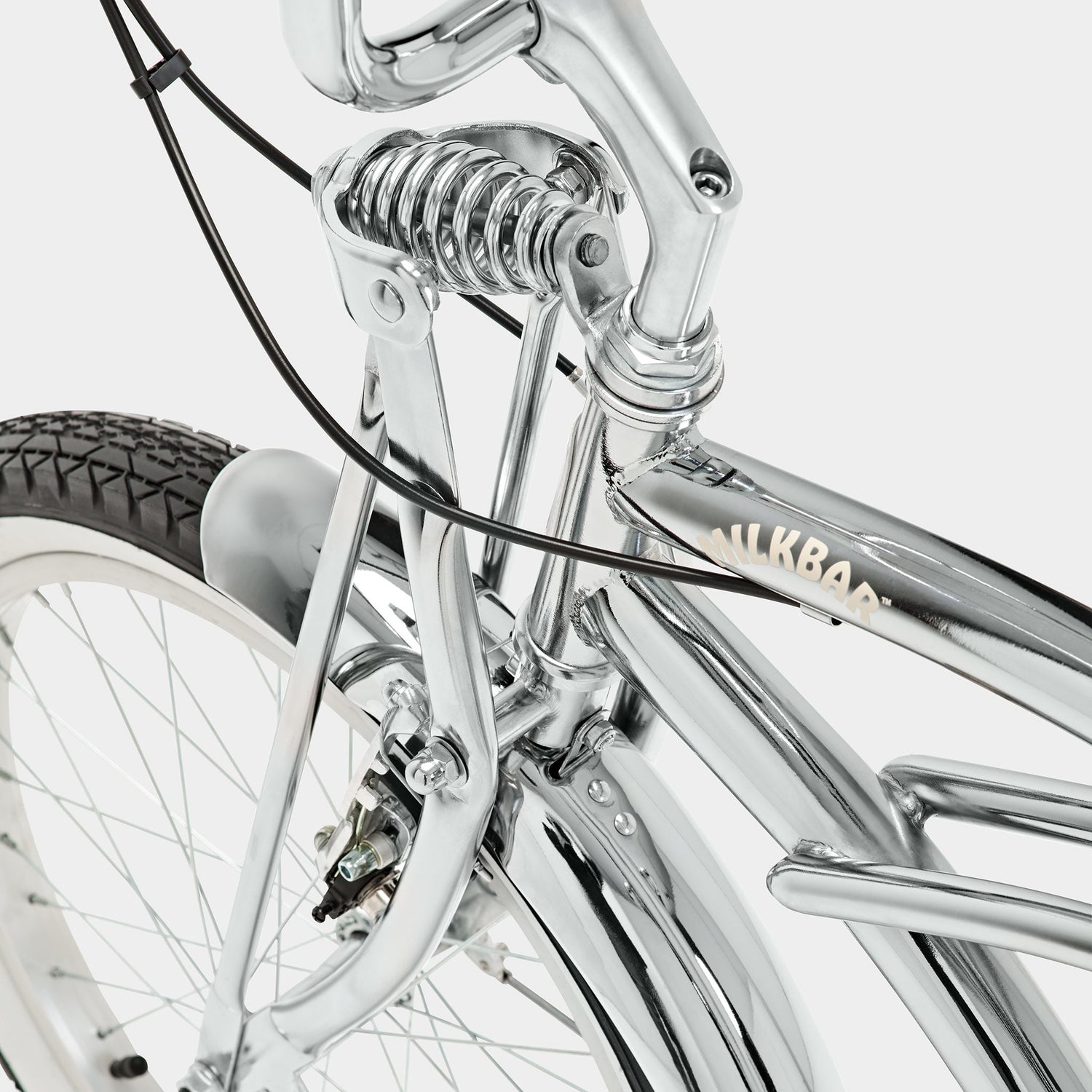 Front wheel detailing of the Milkbar Bikes Sugar High 20" - Icy Chrome