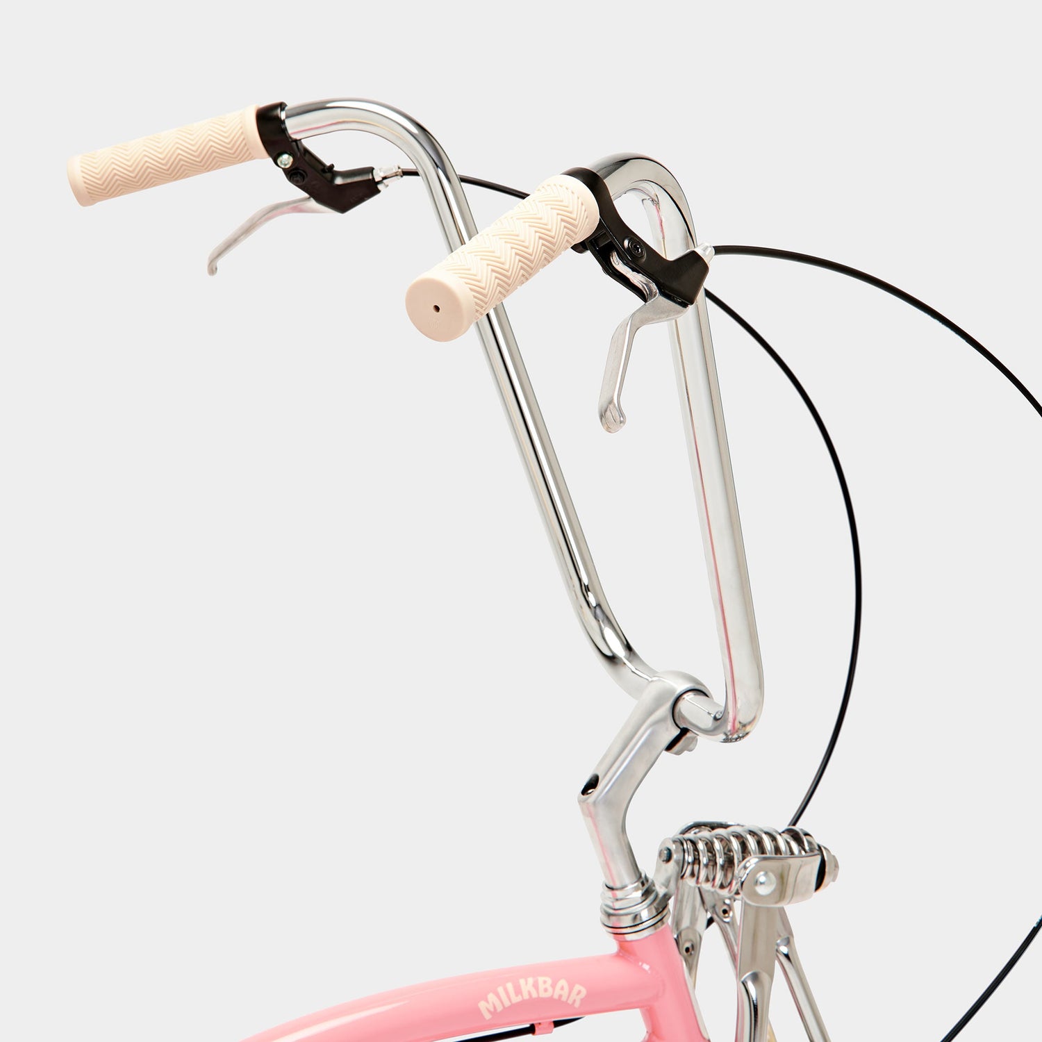 Handle bars of the Milkbar Bikes Sugar High 20" - Pink Lemonade