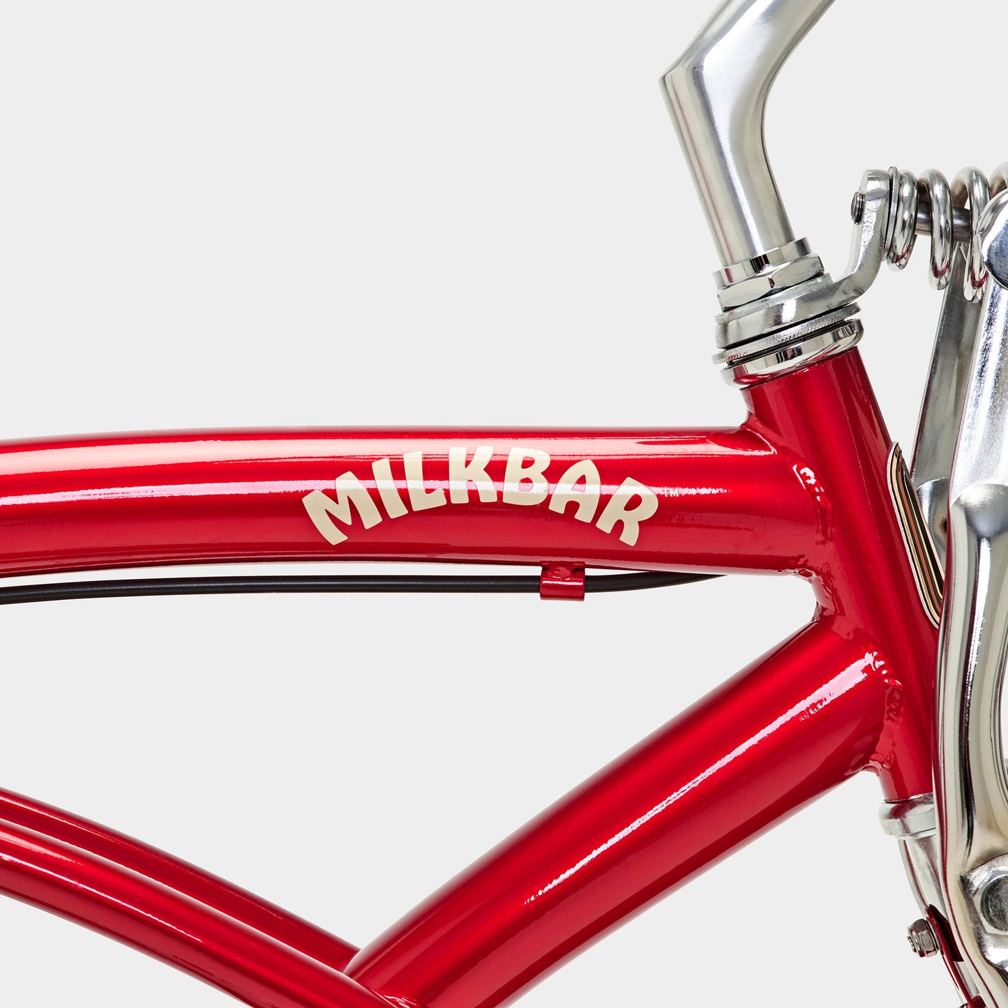 Logo detailing of the Milkbar Bikes Sugar High 26" - Cherry Cola