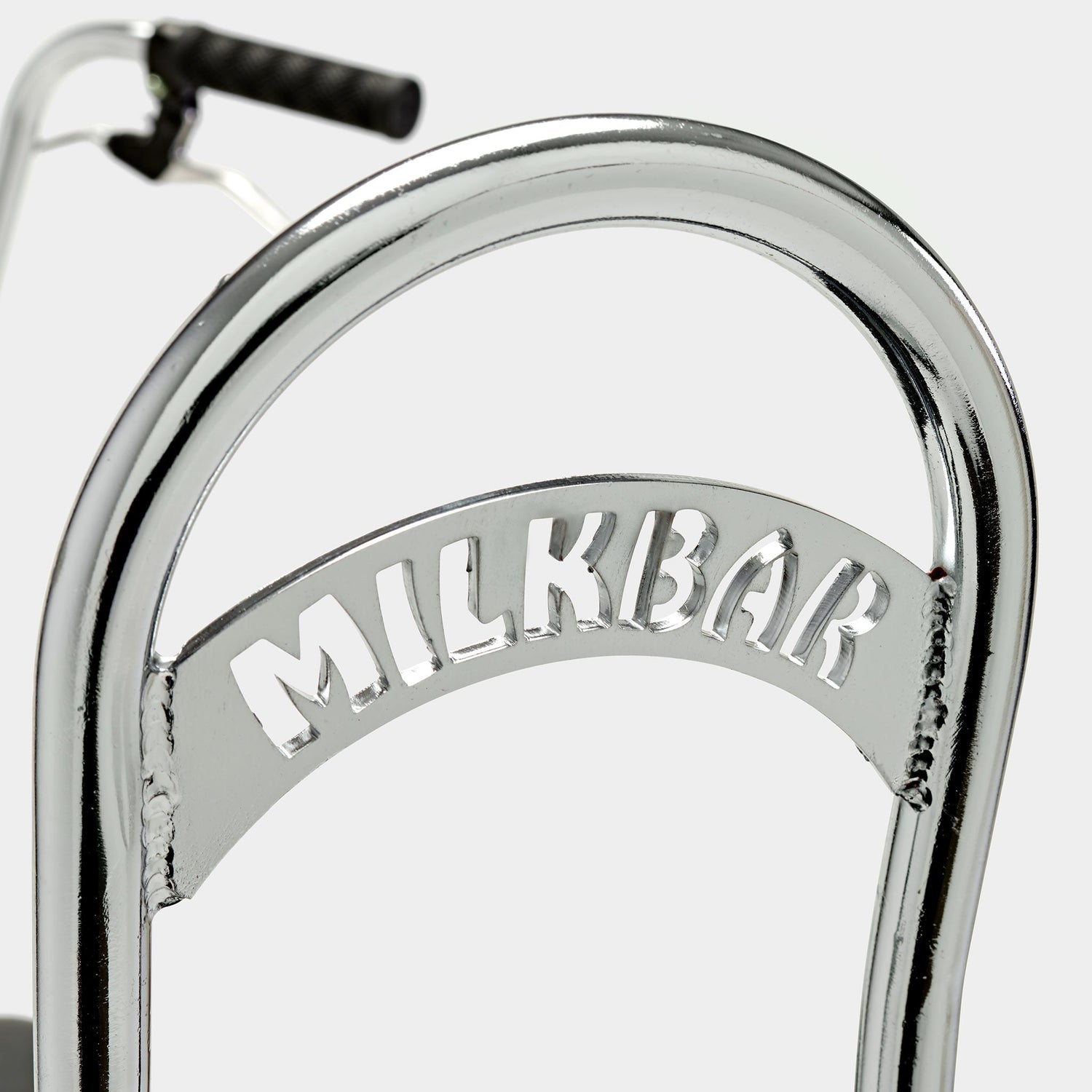 Back bar detailing of the Milkbar Bikes Sugar High 26" - Icy Chrome