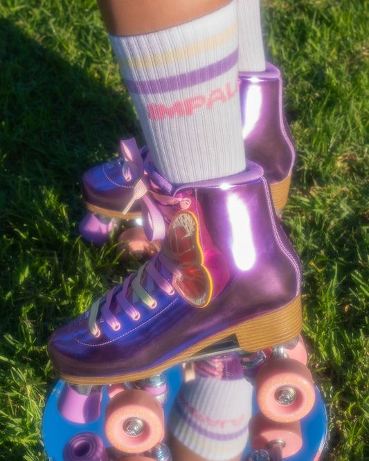 Lifestyle shot of the Impala Quad Skate - Lavender Flutter.