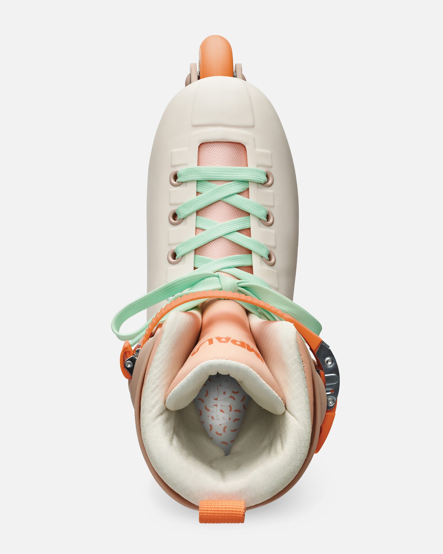 Top view of Sahara inline skate showing a cream boot with mint green laces and peach tongue