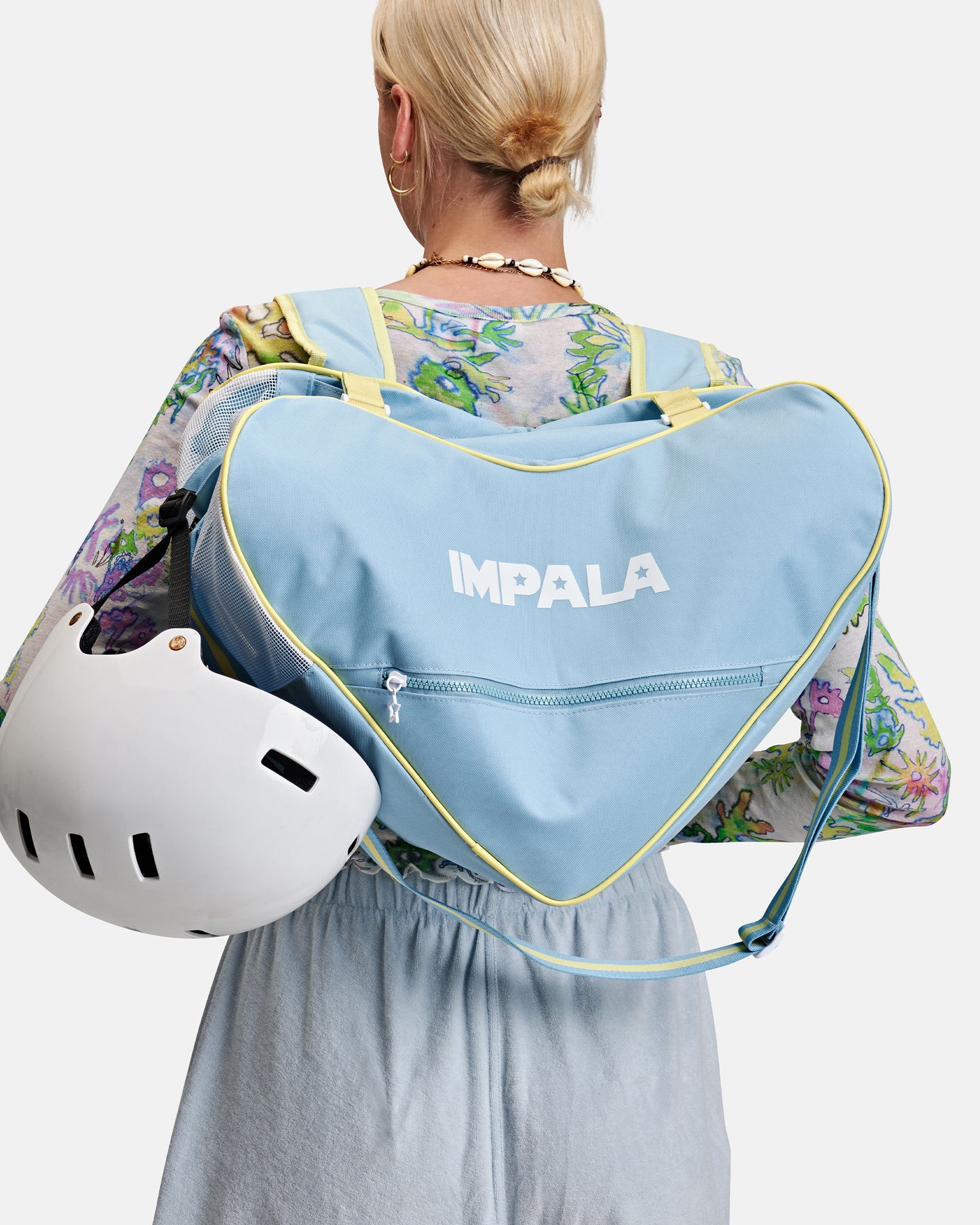 model wearing Impala Skate Bag - Sky Blue/Yellow