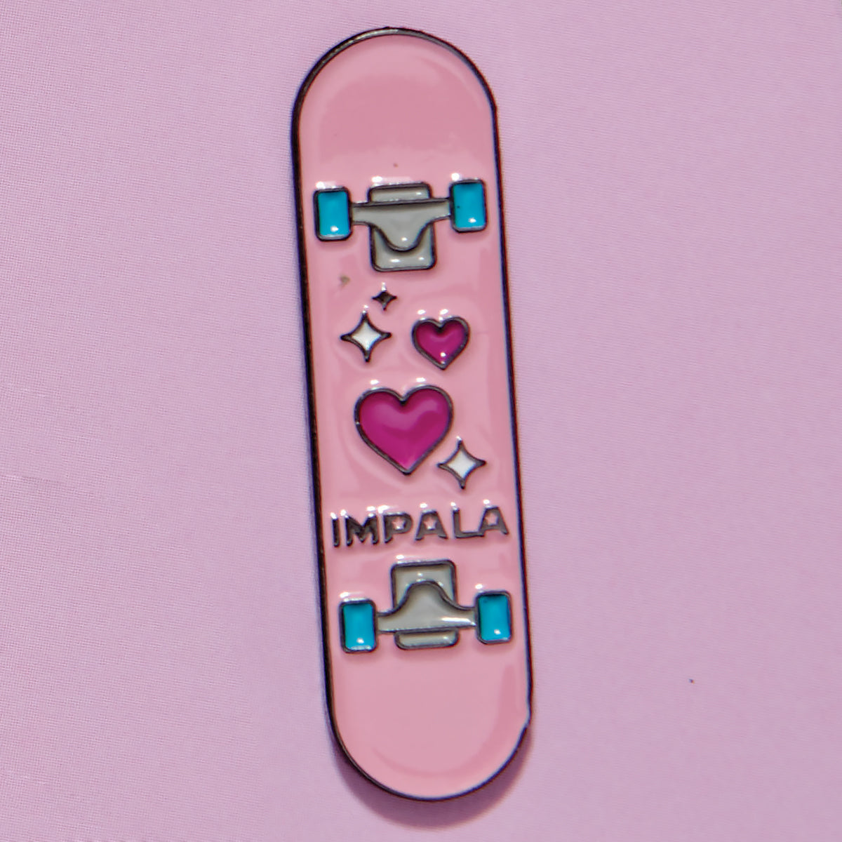 pink skateboard Impala Skate Enamel Pin 