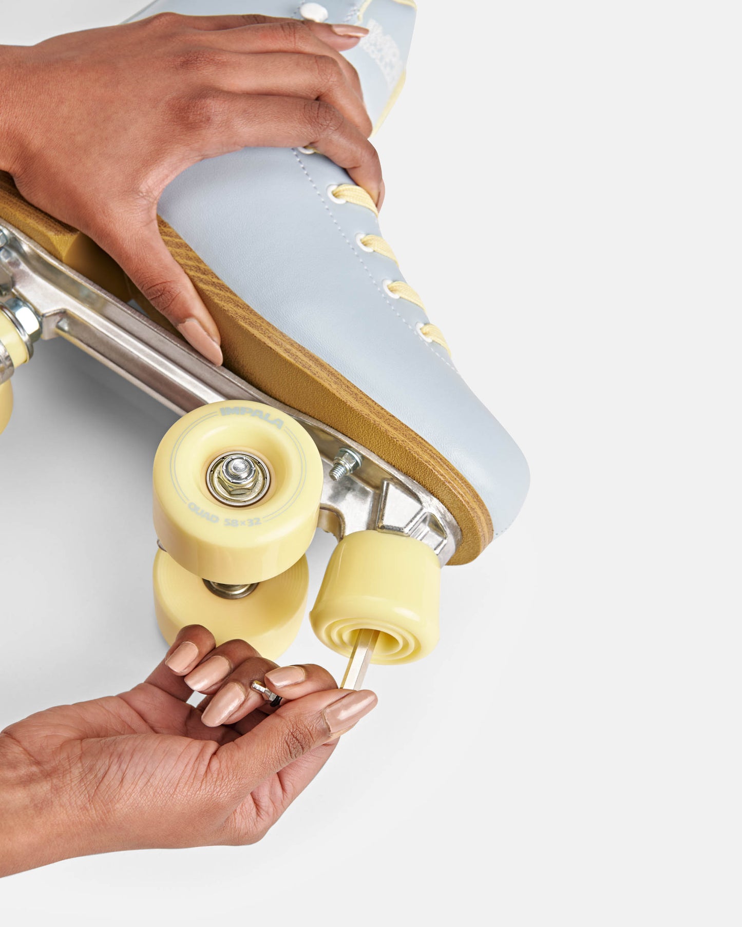 Installing Pastel Yellow Impala Roller Skate Stoppers 