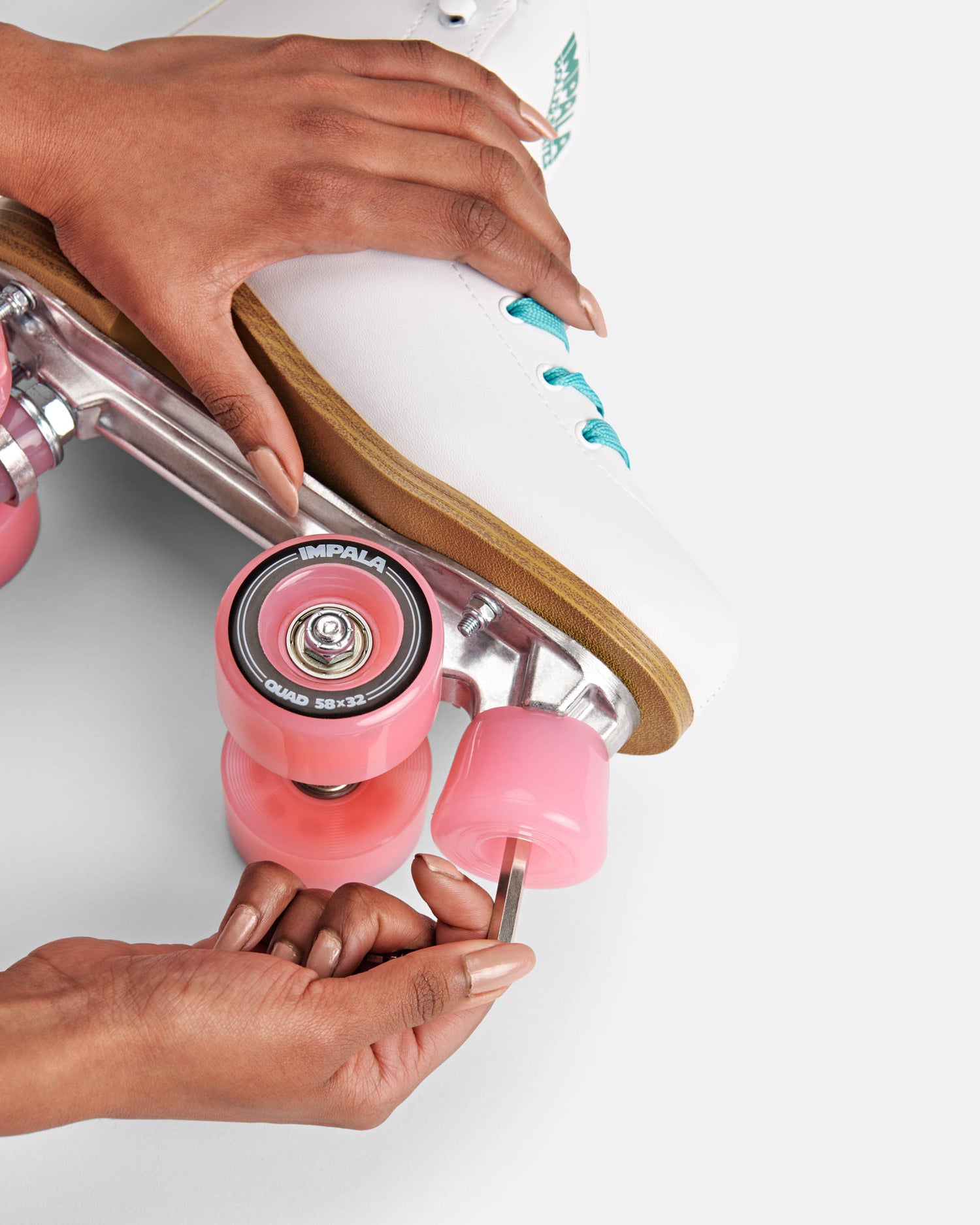 installing Pink Impala Roller Skate Stoppers 