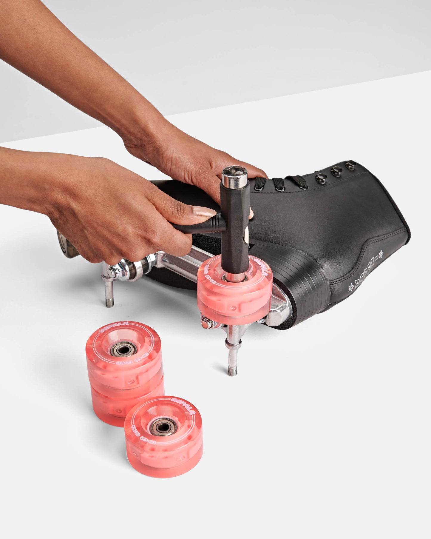 Installing pink LED Light up transparent impala roller skate wheels 