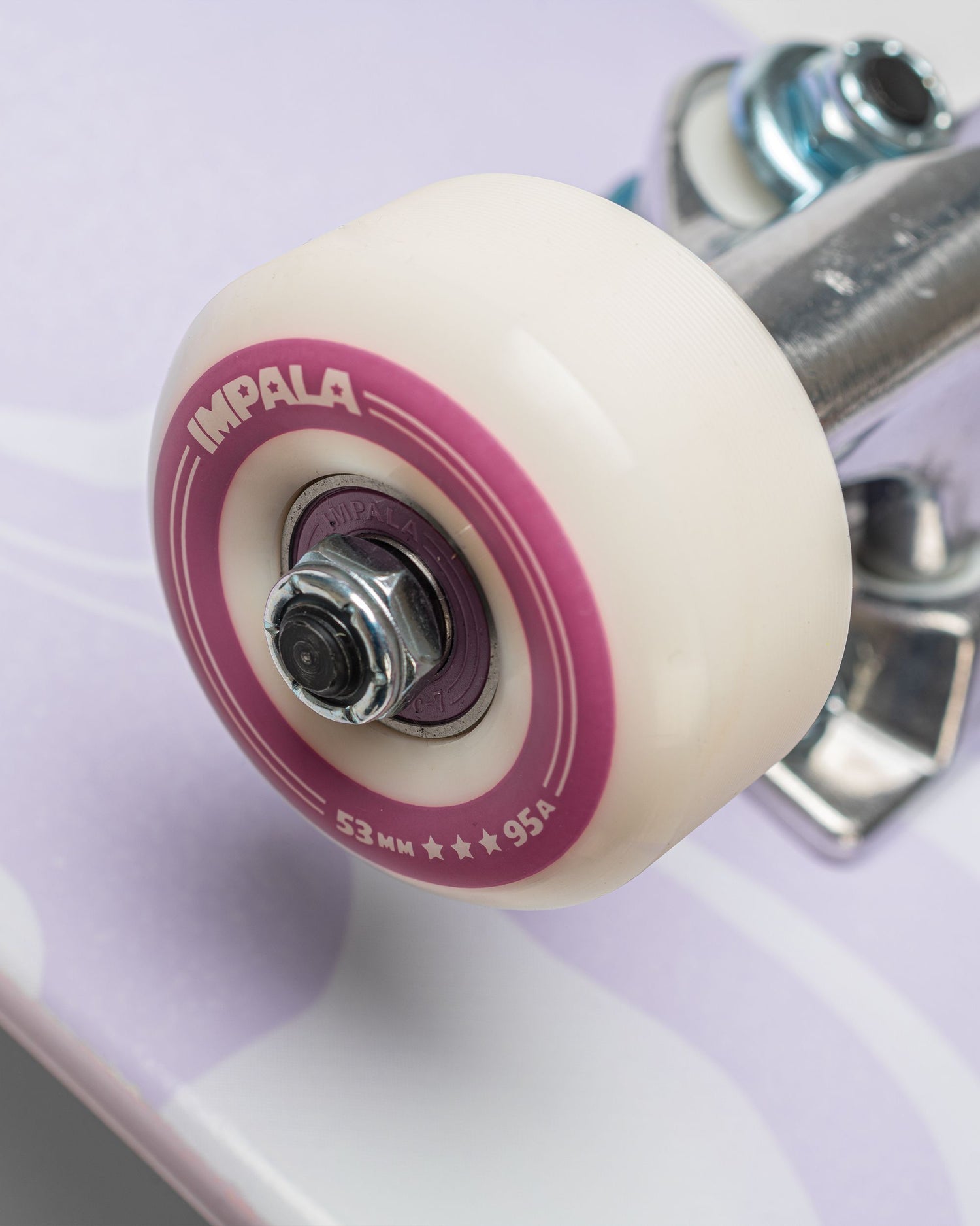 Wheels and bearings detailing of Impala Cosmos Skateboard - Purple