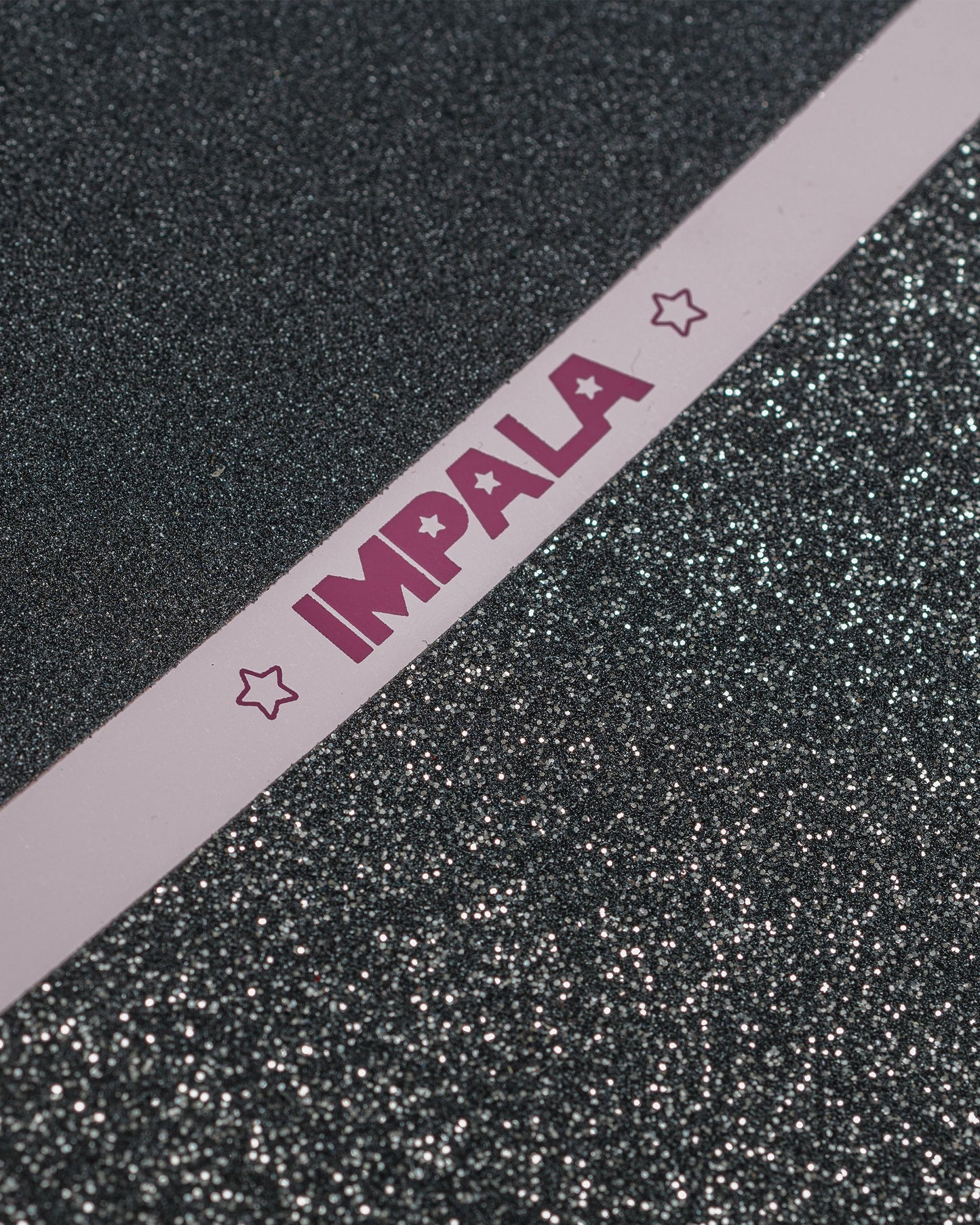Grip tape detailing of Impala Cosmos Skateboard - Pink