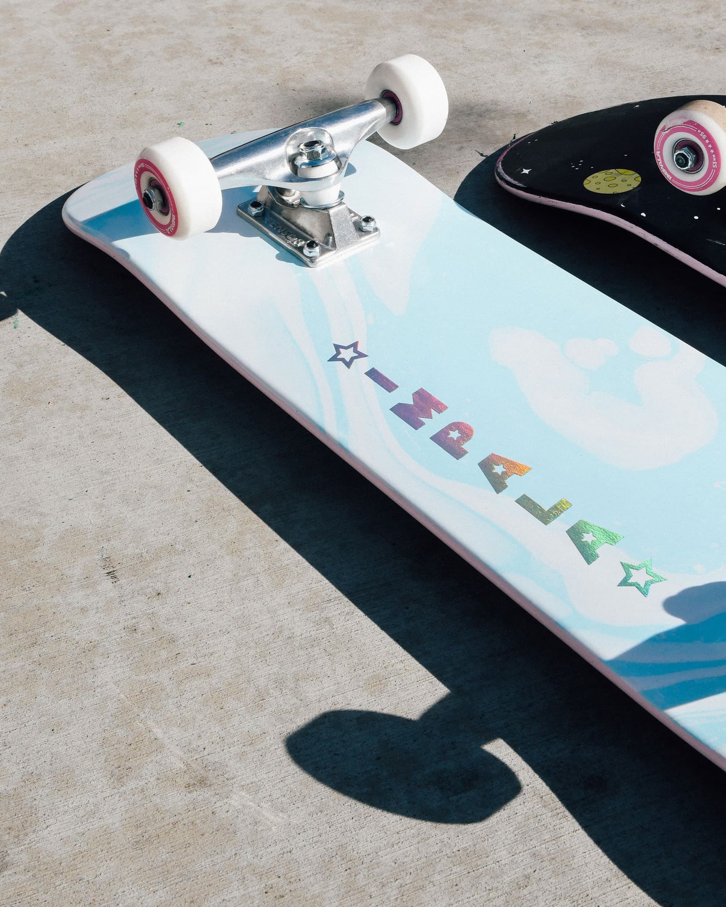 Bottom angled view of Impala Cosmos Skateboard - Blue